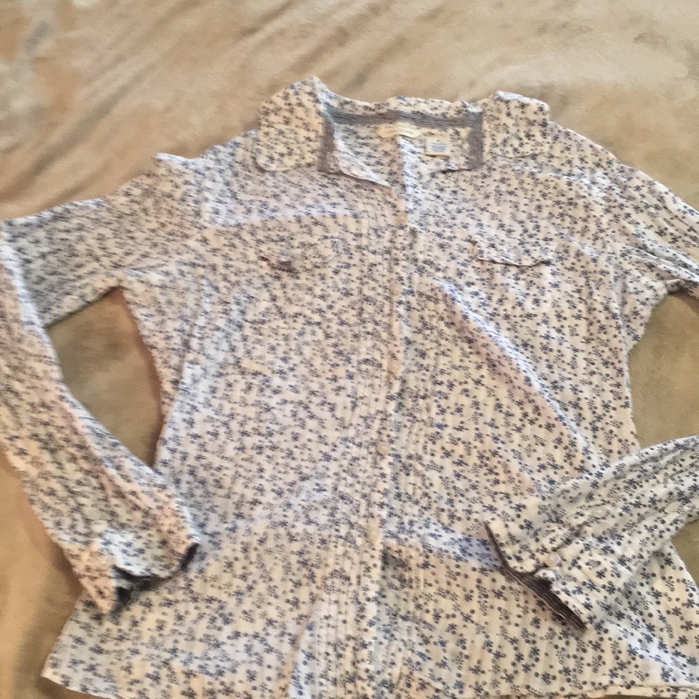 White shirt with blue design